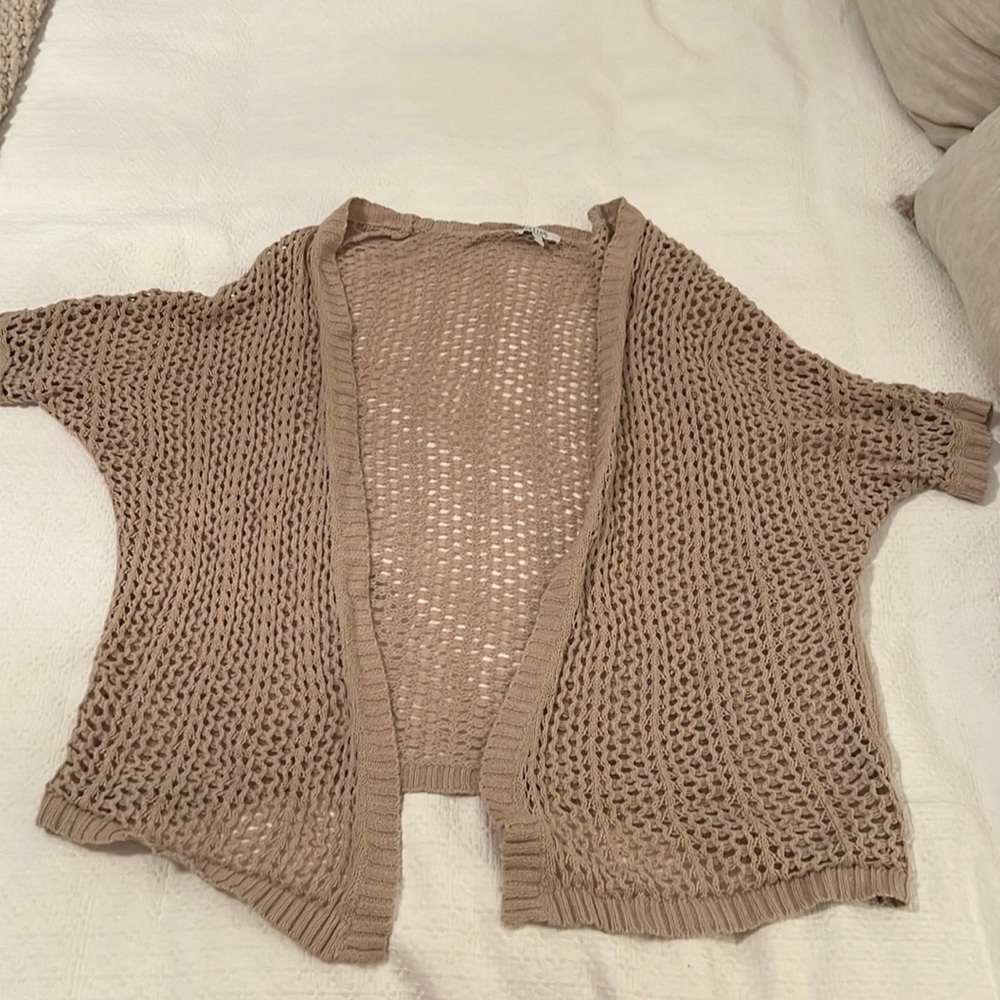 Delia’s tan cardigan